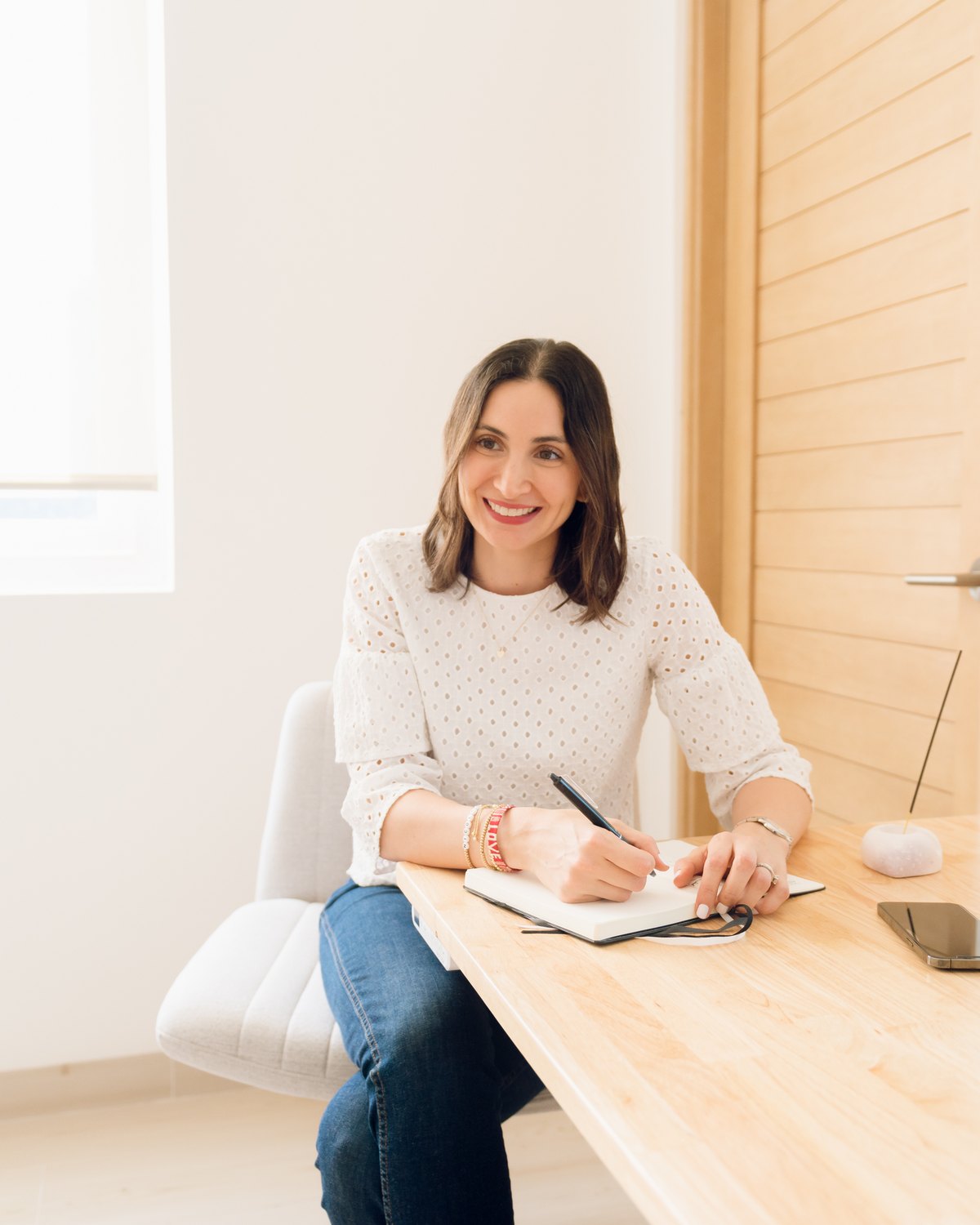 Marcella Chamorro, seated, in her office